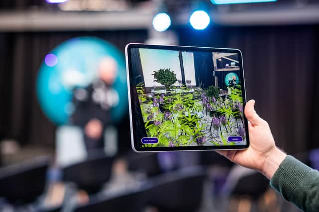 The prototype of a new app that uses augmented reality to demonstrate how a landscape could be rewilded was unveiled at COP26 in Glasgow by international firm Accenture. Picture: Chris Watt