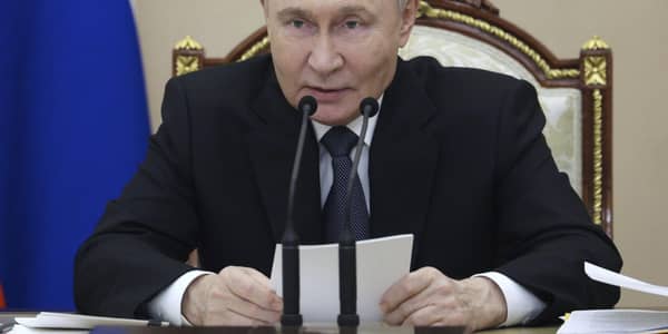 Russian President Vladimir Putin was condemned by Scottish MPs