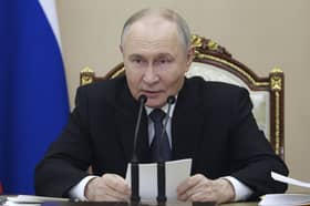 Russian President Vladimir Putin was condemned by Scottish MPs