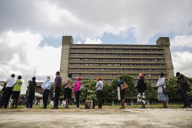 People line up to receive a dose of the AstraZeneca Covid vaccine provided through the global Covax initiative at Kenyatta National Hospital in Nairobi, Kenya (Picture: Brian Ingasnga/AP)