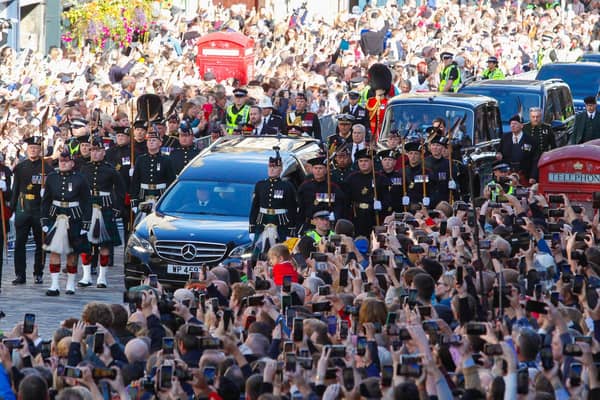 The Queen's coffin is taken from the Palace of Holyroodhouse to St Giles' Cathedral on the Royal Mile in Edinburgh. Image: Scott Louden/The Scotsman.