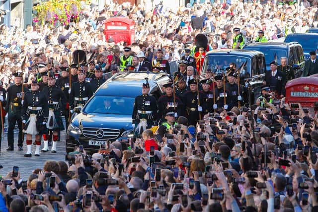 The Queen's coffin is taken from the Palace of Holyroodhouse to St Giles' Cathedral on the Royal Mile in Edinburgh. Image: Scott Louden/The Scotsman.