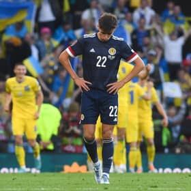 A dejected Aaron Hickey during Scotland's 3-1 defeat to Ukraine in the World Cup play-off semi-final.