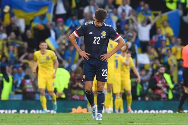 A dejected Aaron Hickey during Scotland's 3-1 defeat to Ukraine in the World Cup play-off semi-final.
