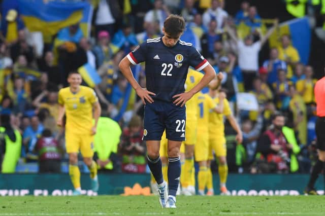 A dejected Aaron Hickey during Scotland's 3-1 defeat to Ukraine in the World Cup play-off semi-final.