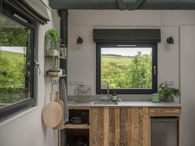 The compact kitchen is equipped with everything you could want.
