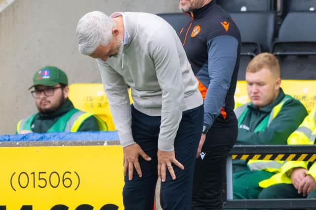 Jim Goodwin is dejected during Dundee United's 2-1 loss at Livingston. (Photo by Paul Devlin / SNS Group)