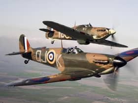 A Spitfire (front) flying alongside a Hurricane from the Battle of Britain Memorial Flight, over RAF Conningsby.
Pic: MoD