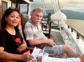 Retired British geologist James Graham Fitton with his wife Sarijah