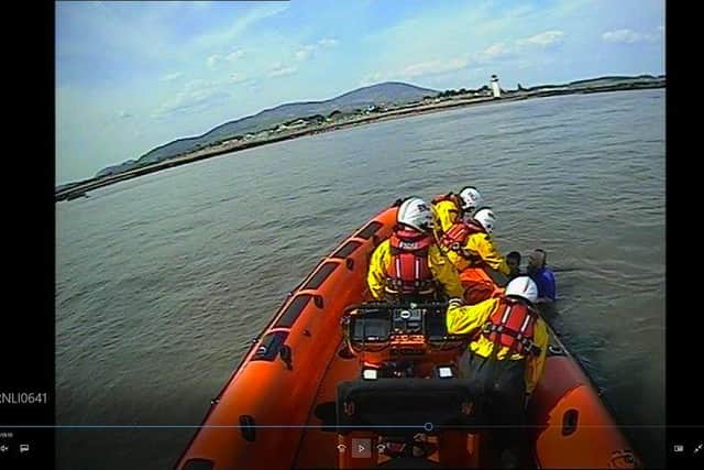 Southerness: 20 holiday makers, including children, rescued by lifeboat after becoming trapped off the Scottish coast