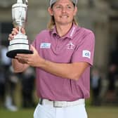 Cameron Smith holds the Claret Jug after winning the 150th Open at St Andrews. Picture: Ian Rutherford