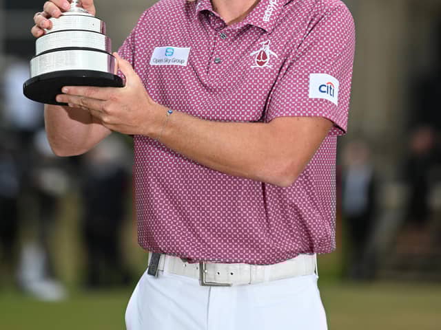 Cameron Smith holds the Claret Jug after winning the 150th Open at St Andrews. Picture: Ian Rutherford