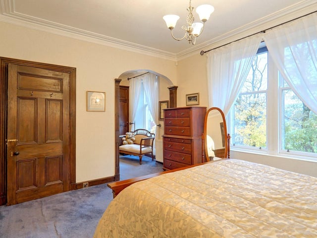 One of the eight bedrooms