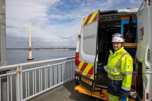 Openreach engineers are pictured at work on the Forth Road Bridge