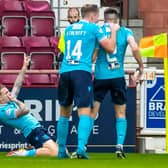 Dundee’s Jason Cummings celebrates after scoring to make it 1-1 against Hearts.