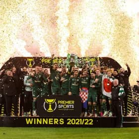 Celtic Captain Callum McGregor lifts the Premier Sports Cup Trophy
 during the Premier Sports Cup Final between Celtic and Hibernian at Hampden Park, on December 19, 2021, in Glasgow, Scotland. (Photo by Alan Harvey / SNS Group)