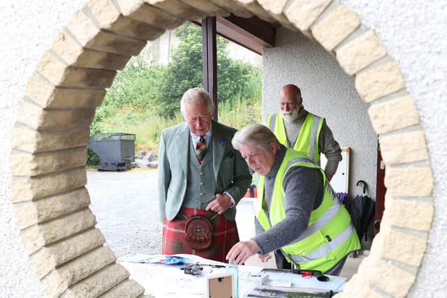 Prince Charles meeting founder Dorcas Sinclair during a visit to Caithness Beach Clean Group at Scrabster Beach, in Thurso. (Picture credit:Paul Campbell/PA Wire)