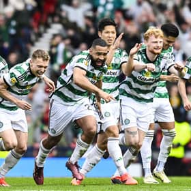 Celtic's Matt O'Riley, Maik Nawrocki, Alistair Johnston, Cameron Carter-Vickers, Tomoki Iwata and Liam Scales celebrate at full time after beating Aberdeen on penalties.