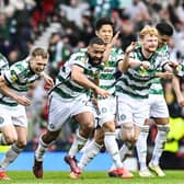 Celtic's Matt O'Riley, Maik Nawrocki, Alistair Johnston, Cameron Carter-Vickers, Tomoki Iwata and Liam Scales celebrate at full time after beating Aberdeen on penalties.