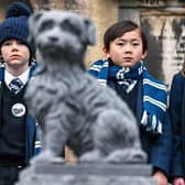 Pupils from George Heriot's School attend a memorial service commemorating the 150th anniversary since the death of Greyfriars Bobby in Greyfriars Kirkyard. Picture: Jeff J Mitchell/Getty Images
