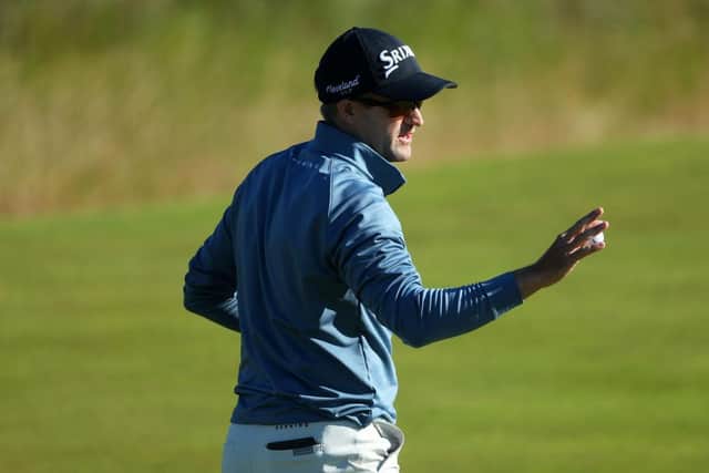 Russell Knox reacts on the 10th green during the first round of the Genesis Scottish Open at The Renaissance Club in East Lothian. Picture: Andrew Redington/Getty Images.