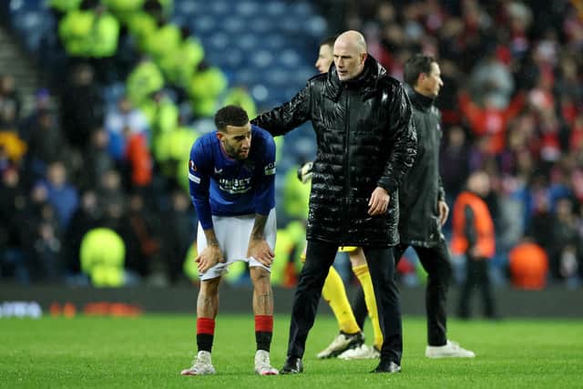 Rangers manager Philippe Clement consoles Connor Goldson after the 1-0 defeat by Benfica.