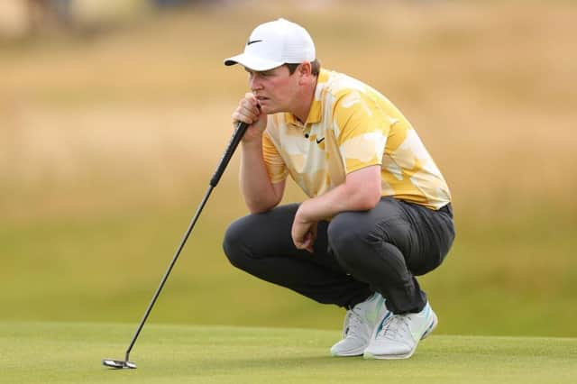 Bob MacIntyre lines up a putt on the 18th green during the third round of the Genesis Scottish Open at The Renaissance Club in East Lothian. Picture: Andrew Redington/Getty Images.