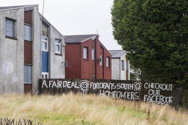 Kerry said: "There wasn't anything wrong with them except a defect with the roofs - they could have put in tiles and proper drainage and double glazing."