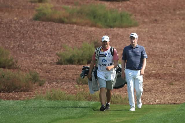 Bob Macintyre walks down the first fairway during day three of the DP World Tour Championship at Jumeirah Golf Estates. Picture: Andrew Redington/Getty Images