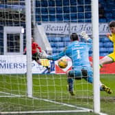 Kevin Nisbet scores Hibs' winning goal in a 2-1 victory over Ross County. Photo by Alan Harvey / SNS Group