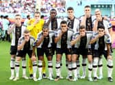 Germany players pose with their hands covering their mouths as they line up for the team photos prior to the FIFA World Cup Qatar 2022 Group E match between Germany and Japan at Khalifa International Stadium on November 23, 2022 in Doha, Qatar. (Photo by Alexander Hassenstein/Getty Images)