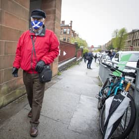 A voter heads to a polling station yesterday but the full results are not expected to be known until tomorrow (Picture: Jane Barlow/PA Wire)