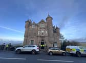 Officers wait outside Selkirk Sheriff Court. Picture: Lisa Ferguson