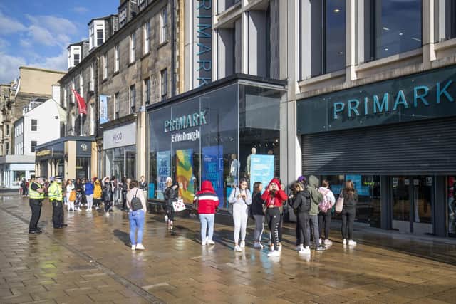People queue outside the flagship Scottish Primark store on Princes Street in Edinburgh after it reopened following the initial spring 2020 lockdown (Picture: Jane Barlow/PA Wire)