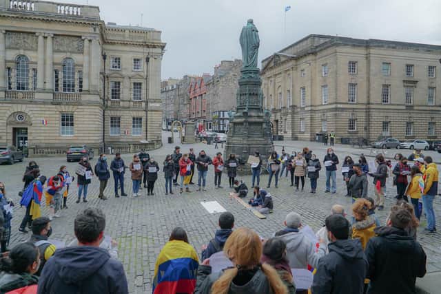 Colombian demonstrators gather to demand action from UK and Scottish governments.