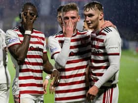Hamilton players celebrate after making it 2-0 during a cinch Championship match between Queen of the South and Hamilton at Palmerston Park, on January 02, 2022, in Dumfries, Scotland. (Photo by Bruce White / SNS Group)