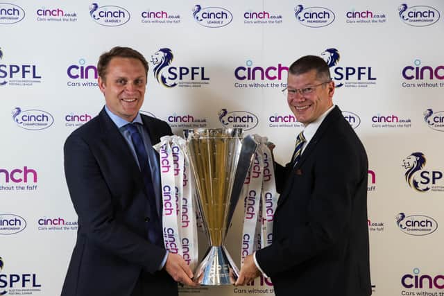 SPFL chief executive Neil Doncaster (right) with cinch chief executive Robert Bridge and the cinch Premiership trophy. (Photo by John Phillips/Getty Images for cinch)