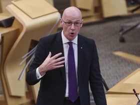 Deputy First Minister John Swinney told the SNP conference to "stand up and be counted before it's too late" to defend devolution. Picture: Fraser Bremner/Daily Mail/PA Wire