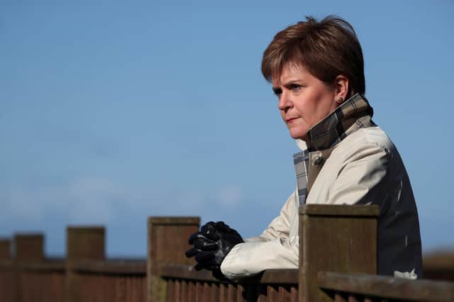 Nicola Sturgeon said in the early days of the Covid outbreak 'we were faced with a horrendous situation, with horrendous decisions that flowed from that' (Picture: Russell Cheyne/PA)