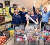 A previous winner celebrates her Aldi haul