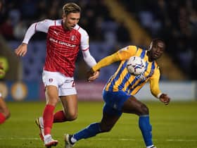 Angus Macdonald (left), pictured in action for previous club Rotherham, has joined Aberdeen following his release from Swindon Town.