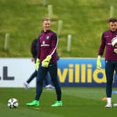 Celtic goalkeeper Joe Hart and new Rangers signing Jack Butland during an England training session in 2015. (Photo by Richard Heathcote/Getty Images)