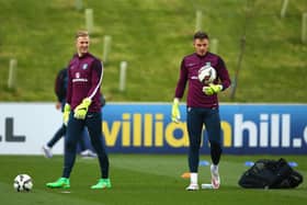 Celtic goalkeeper Joe Hart and new Rangers signing Jack Butland during an England training session in 2015. (Photo by Richard Heathcote/Getty Images)