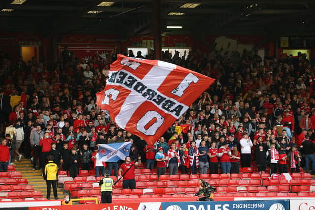 Aberdeen fans in the Red Shed were in fine voice. (Photo by Alan Harvey / SNS Group)