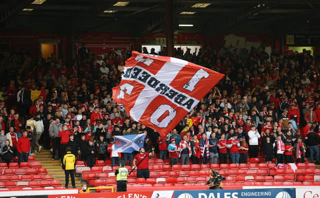 Aberdeen fans in the Red Shed were in fine voice. (Photo by Alan Harvey / SNS Group)