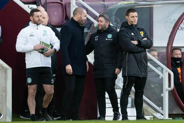 Former Hearts manager Robbie Neilson and Hibs boss Lee Johnson during the new year derby fixture at Tynecastle. (Photo by Ross Parker / SNS Group)