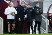 Former Hearts manager Robbie Neilson and Hibs boss Lee Johnson during the new year derby fixture at Tynecastle. (Photo by Ross Parker / SNS Group)