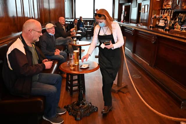 Pubs and bars must, by law, take contact details from all their customers from today, as new Scottish government rules on hospitality come into force. (Photo by Jeff J Mitchell/Getty Images)