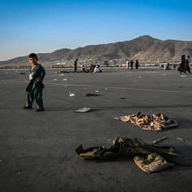A young Afghan child at Kabul airport who was waiting with relatives in the hope of being evacuated. Some children have become separated from their families in the turmoil (Picture: Wakil Kohsar/AFP via Getty Images)