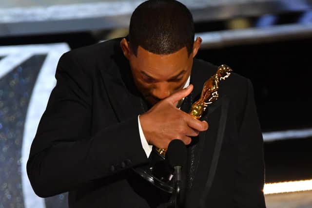 Will Smith accepts the award for Best Actor in a Leading Role for "King Richard"